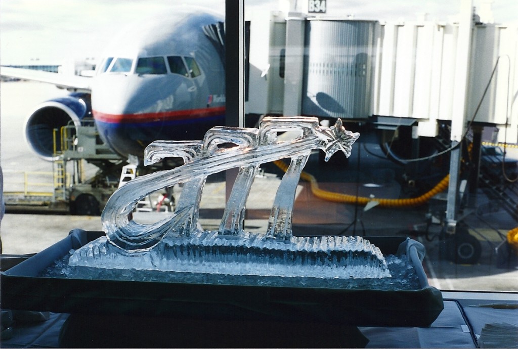 an ice sculpture in front of an airplane