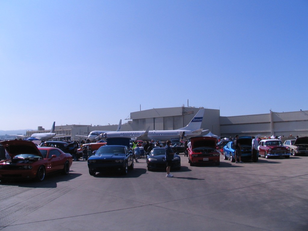 a group of cars parked in a parking lot