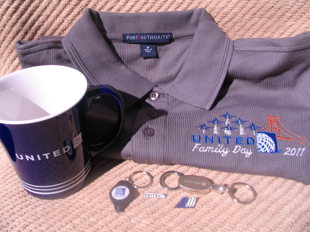 a polo shirt with a keychain and a mug