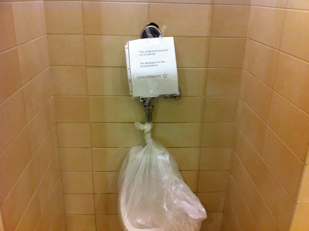 a paper in a plastic bag from a toilet