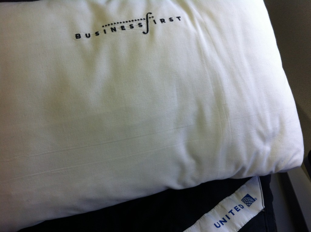 a white pillow with black text on it