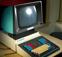 a computer with a screen and keyboard