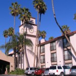 a building with palm trees