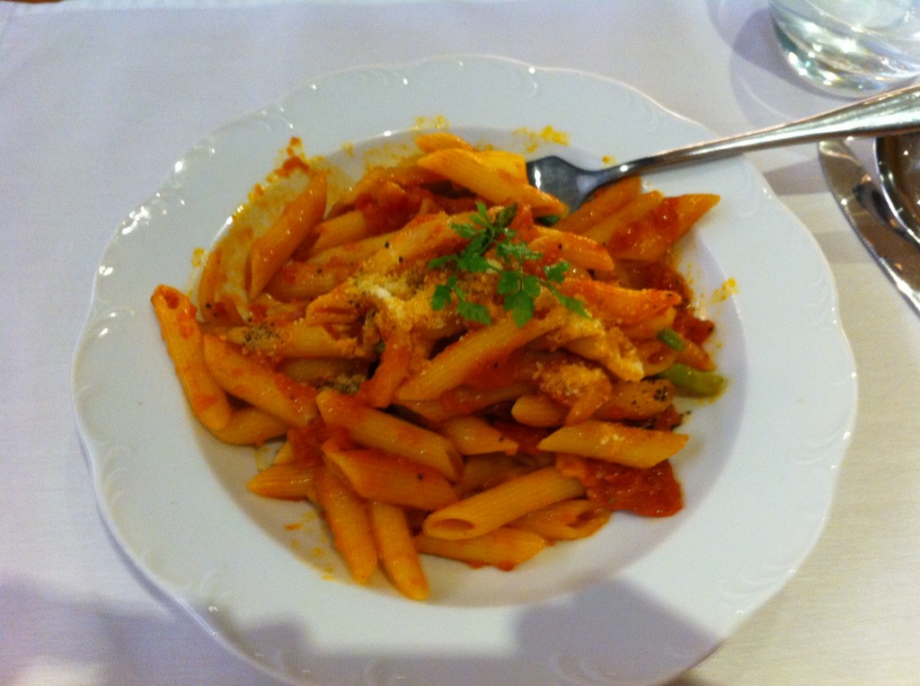 a plate of pasta with a fork