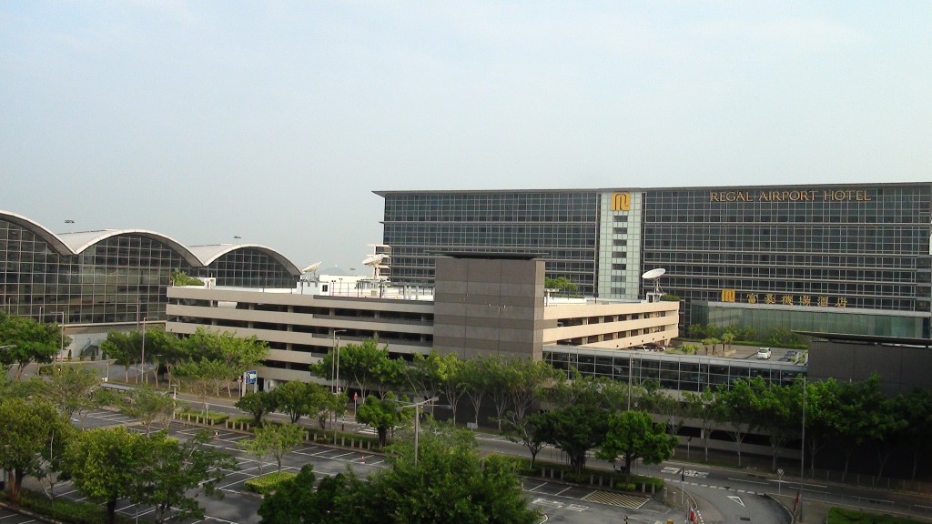 a large building with a parking lot