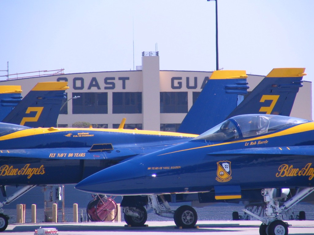 a group of blue and yellow airplanes