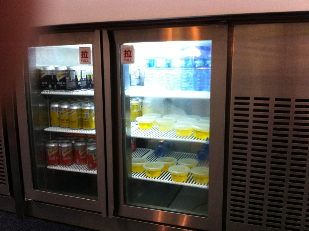 a refrigerator with drinks in it