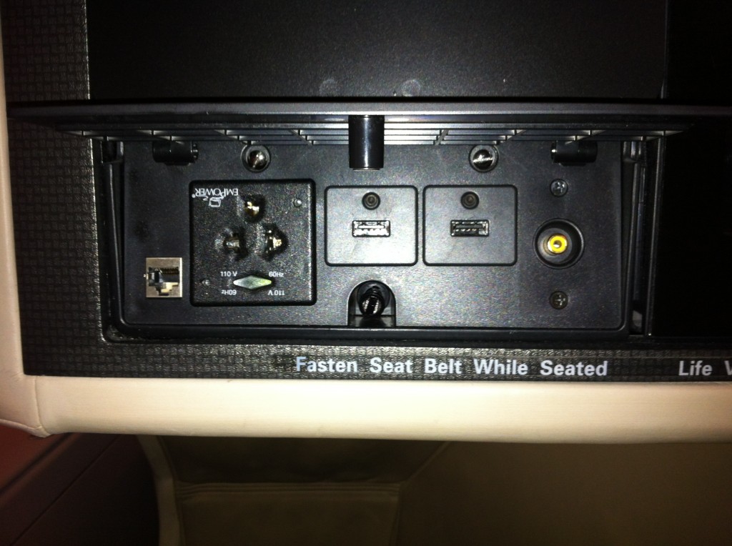 a black panel with ports and switches