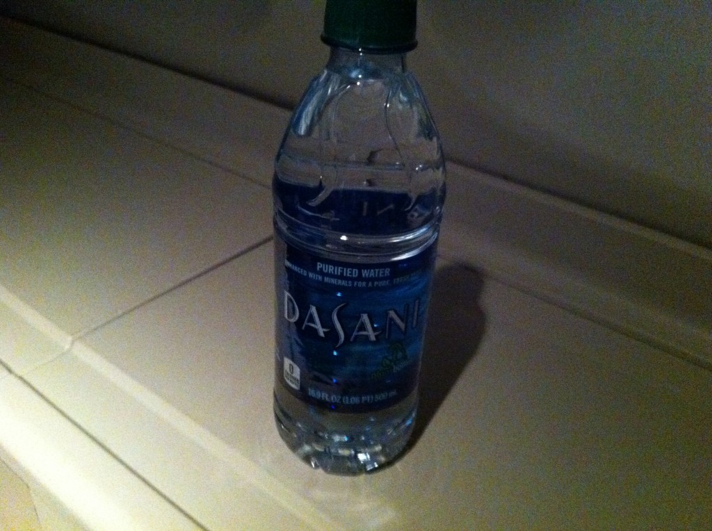 a bottle of water on a counter