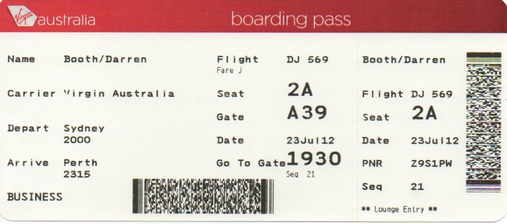 a close-up of a boarding pass