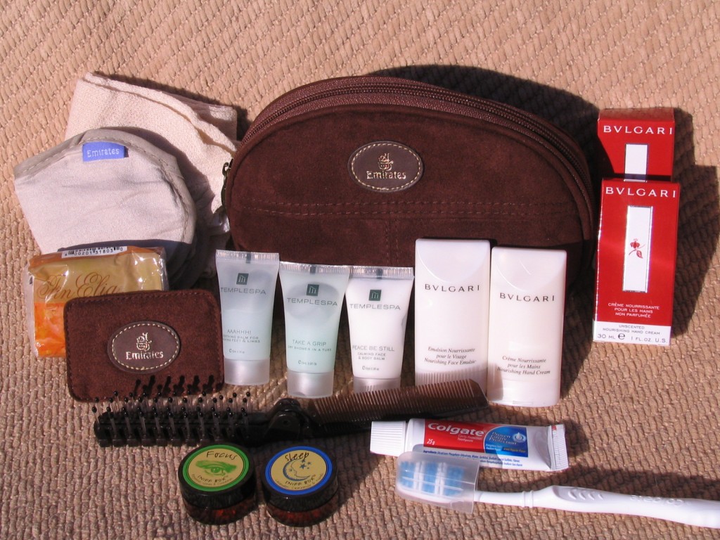 a group of toiletries and a bag