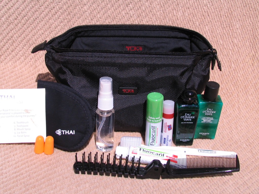 a black bag with a variety of items on it