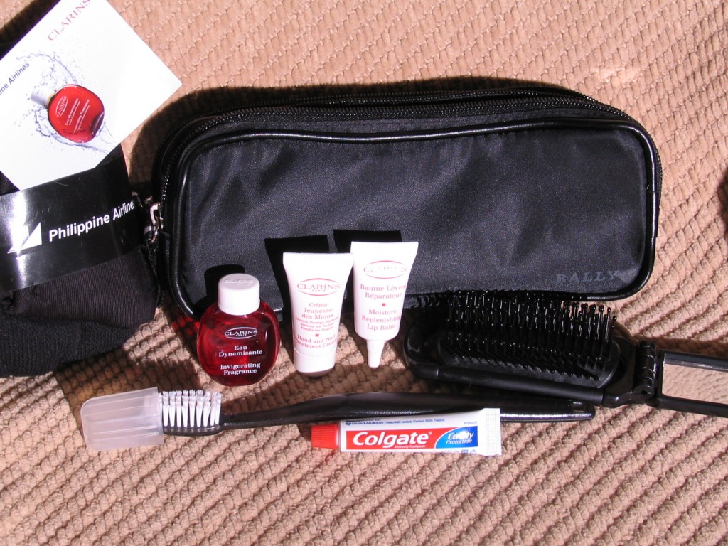 a bag with a toothbrush and toothpaste
