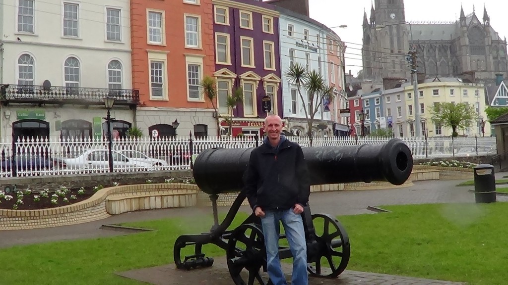 a man standing in front of a cannon