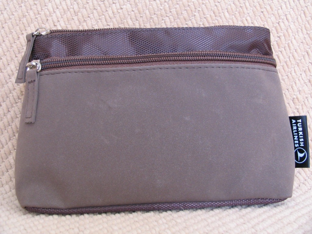 a brown pouch with a zipper