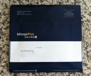 a blue envelope with white text and a white stripe