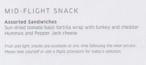 a menu of a flight snack