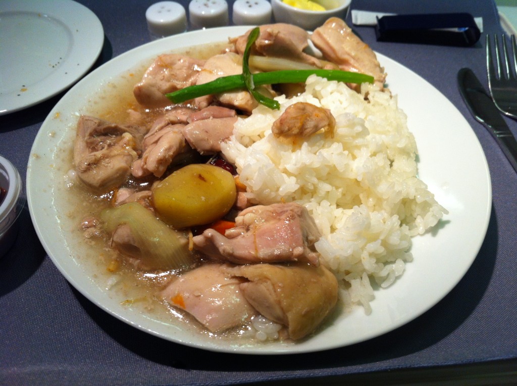 a plate of rice and meat